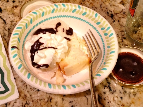 Junior's cheesecake w/ coconut milk ice cream, whipped cream, and hot fudge